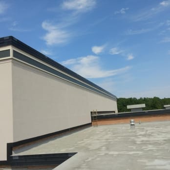 NorthKor Construction and Painting - the roof of a commercial building - Painters Near Me - Frankfort, Indiana NorthKor Construction and Painting - the roof of a commercial building - Painters Near Me - Frankfort, Indiana
