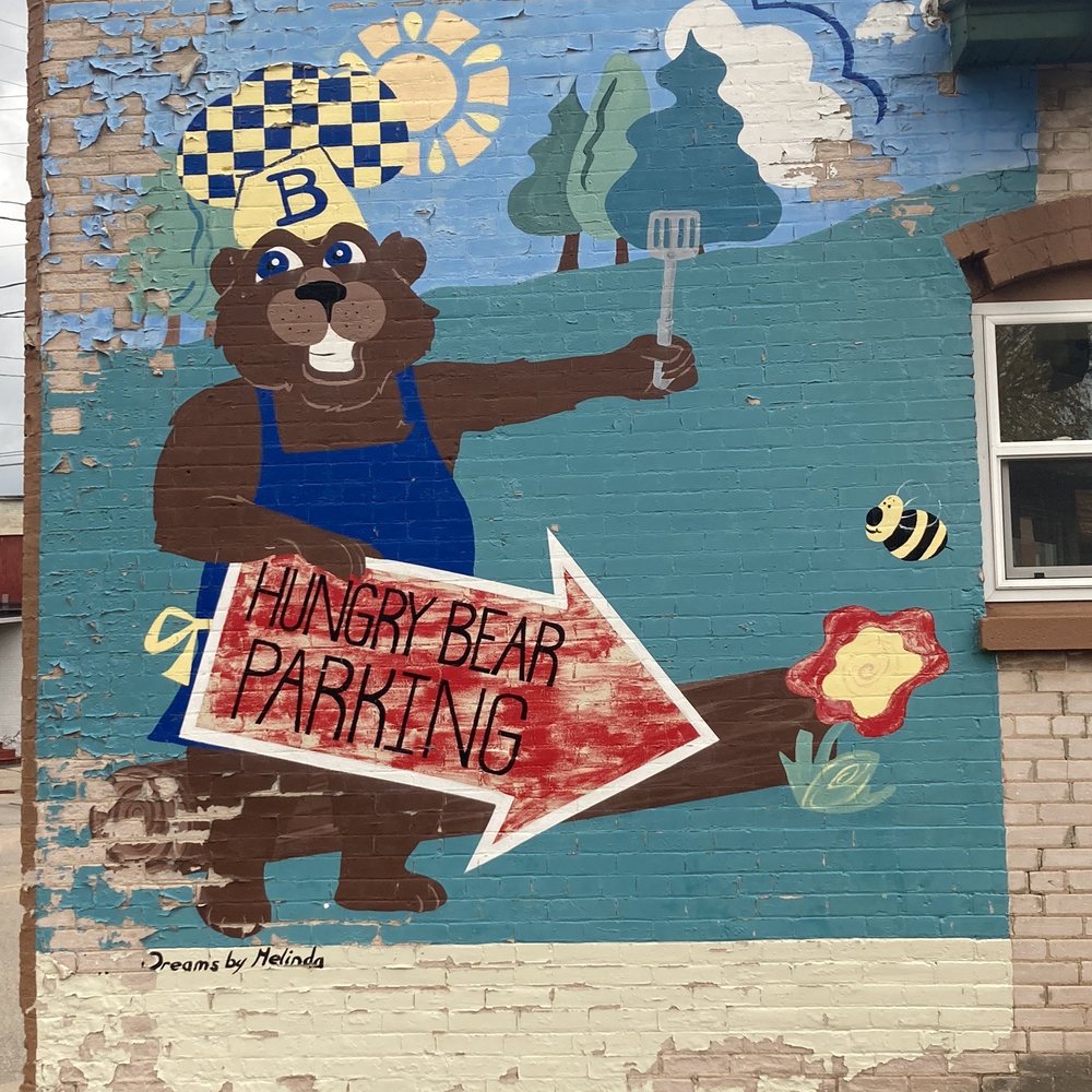 Hungry Bear - Cafe & Catering - Hand painted, saying showing where the parking lot us. - Cafes Near Me - Bonduel, Wisconsin