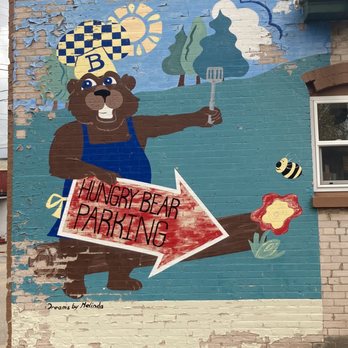 Hungry Bear - Cafe & Catering - Hand painted, saying showing where the parking lot us. - Cafes Near Me - Bonduel, Wisconsin