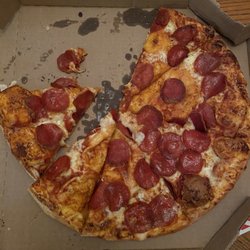 Domino's - Multiple large bubbles and large pieces of no sauce cheese or anything