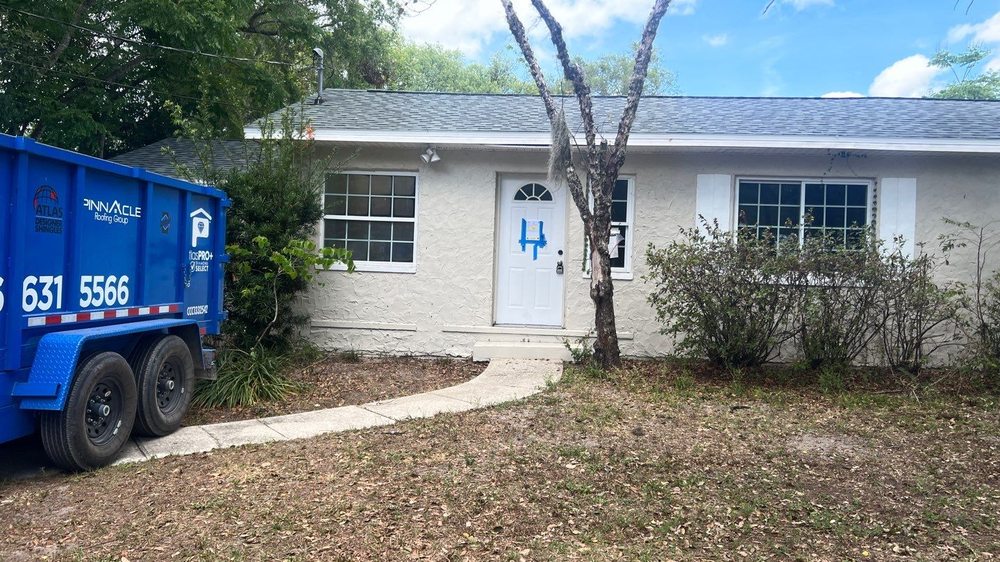 Slide of Pinnacle Roofing Group