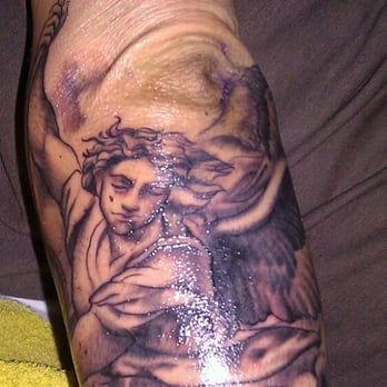 Alchemy Tattoo - Roger Selinger started this St. Michael the Archangel and will finish it in color. He's so bad ass! So are Mike and Chris! - Tattoo Near Me - Los Angeles, California Alchemy Tattoo - Roger Selinger started this St. Michael the Archangel and will finish it in color. He's so bad ass! So are Mike and Chris! - Tattoo Near Me - Los Angeles, California