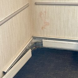 Quest Diagnostics - Stuff slopped on walls in waiting room - radiator falling off the wall and dirty.