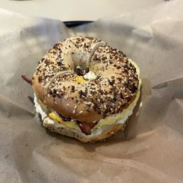 Everything bagel sandwich with american cheese bacon and egg! I added scallion cream cheese to both sides of the bagel. Everything bagel sandwich with american cheese bacon and egg! I added scallion cream cheese to both sides of the bagel.