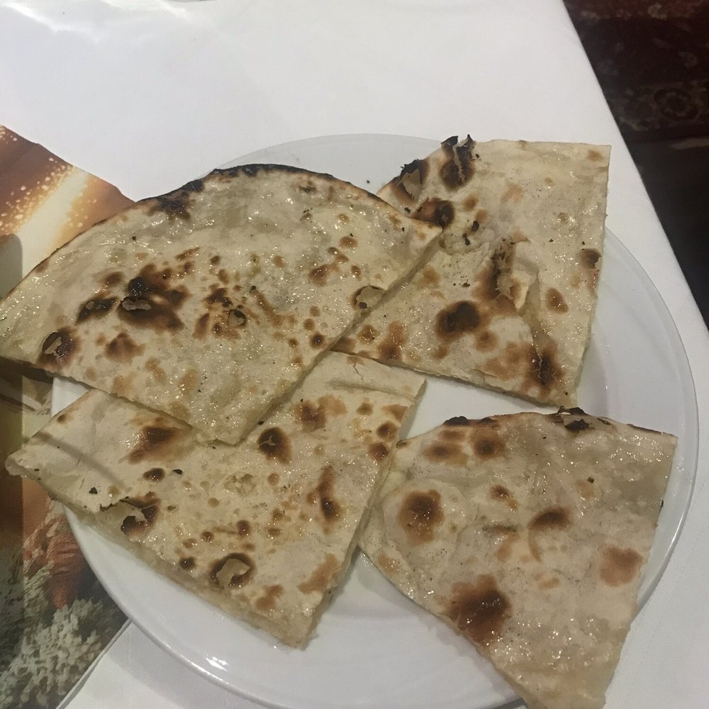 Indian Palace - Naan with raisins and coconut - Indian Near Me - Freising, BY