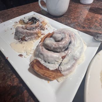White Wolf Cafe - 2 of the 4 Cinnamon Buns. Couldn't wait for the photo. - New American Near Me - Orlando, Florida White Wolf Cafe - 2 of the 4 Cinnamon Buns. Couldn't wait for the photo. - New American Near Me - Orlando, Florida