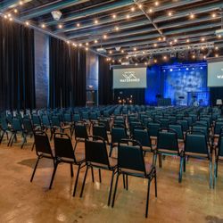 Watershed - Large group gatherings space. Audio/Visual options available. Seating capacity 250. Maximum occupancy 450. Chairs included.