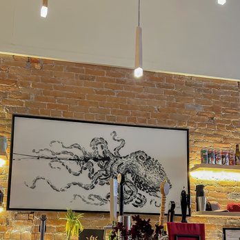 Tanoshii - a drawing of a octopus on a brick wall - Japanese Near Me - Bozeman, Montana Tanoshii - a drawing of a octopus on a brick wall - Japanese Near Me - Bozeman, Montana