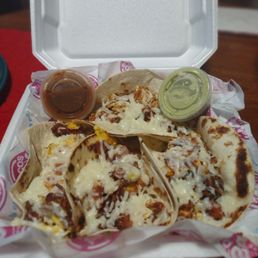 4 Breakfast tacos bacon and chorizo. 4 Breakfast tacos bacon and chorizo.