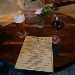 a menu and two glasses of wine