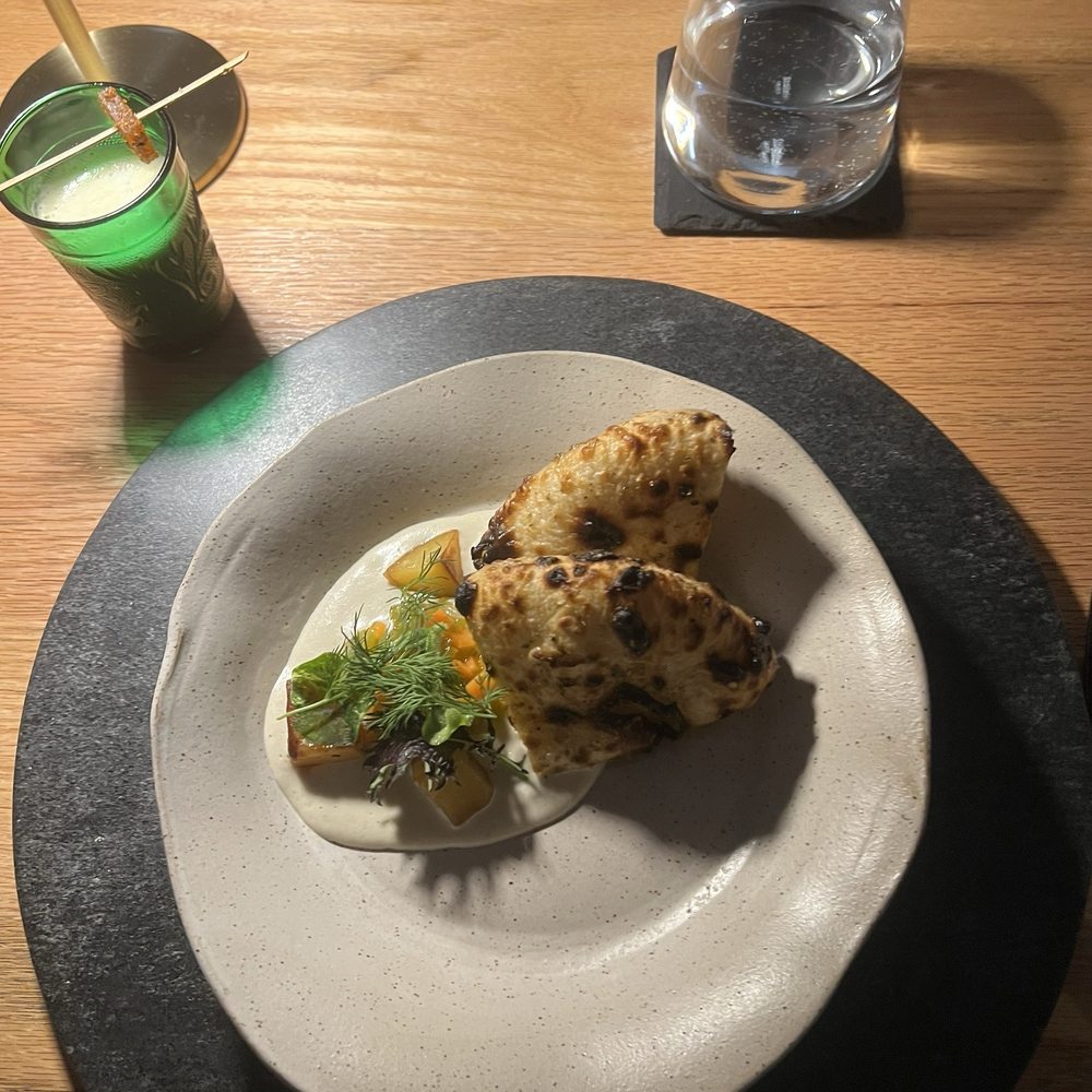 Brutø - Bread service, amazing sourdough with white mole and fresh herbs from the garden. - Tapas/Small Plates Near Me - Denver, Colorado Brutø - Bread service, amazing sourdough with white mole and fresh herbs from the garden. - Tapas/Small Plates Near Me - Denver, Colorado