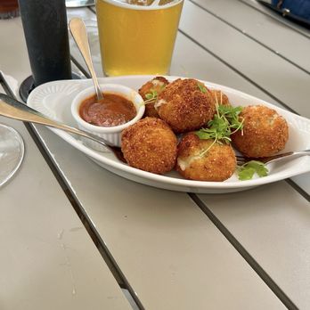 Bistro Menil - Potato Potato and Manchego Cheese Croquettes - Bars Near Me - Houston, Texas Bistro Menil - Potato Potato and Manchego Cheese Croquettes - Bars Near Me - Houston, Texas