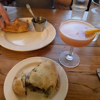 Buenos Aires Café - Este - Lenteja (front) and chicken empanadas with Old Argentine cocktail. - Argentine Near Me - Austin, Texas Buenos Aires Café - Este - Lenteja (front) and chicken empanadas with Old Argentine cocktail. - Argentine Near Me - Austin, Texas