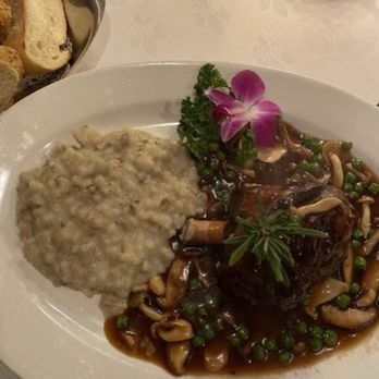 Michael's - Braised lamb shank with mushrooms, peas, and mashed or risotto. Not sure what it was but it was divine. - Italian Near Me - Brooklyn, New York Michael's - Braised lamb shank with mushrooms, peas, and mashed or risotto. Not sure what it was but it was divine. - Italian Near Me - Brooklyn, New York