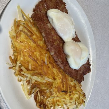 The Hungry Fisherman - Pouched eggs and corned beef hash with hash browns. Delicious way to start the day - Seafood Near Me - Morro Bay, California The Hungry Fisherman - Pouched eggs and corned beef hash with hash browns. Delicious way to start the day - Seafood Near Me - Morro Bay, California