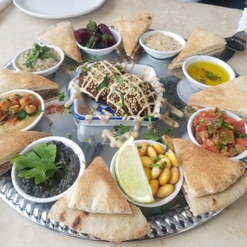 Maha's - App platter. Pita pieces are about the size of a dorito - Egyptian Near Me - Toronto, Ontario
