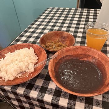 Tap Tap Cuisine - Halfway through my meal of Vegan Diri Blan, Sos Pwa and Legim with passionfruit juice - Haitian Near Me - Portland, Oregon