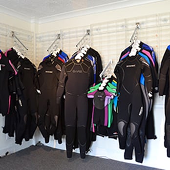 Blue Octopus Scuba - Wetsuits in the retail space. - Scuba Diving Near Me - Alexandria, Virginia