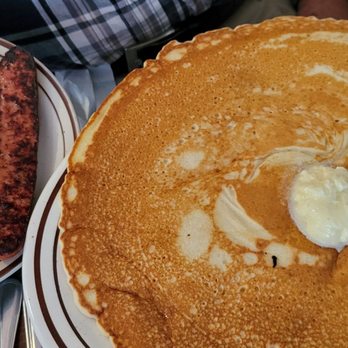 Wild Huckleberry - Eggs and German sausage and a huge pancake. - Breakfast & Brunch Near Me - Wenatchee, Washington