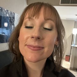 Megan Maier Artistry - Bride hair and makeup done by Megan Maier for 10/21/23 wedding. Photo taken at 1am, makeup held up great! (bride already undid hairdo prior)
