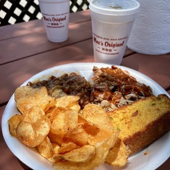 Moe's Original BBQ - Pork platter with house made chips, baked beans and corn bread - Barbeque Near Me - Daphne, Alabama