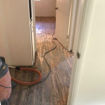 Imperial Flooring Concepts - a hardwood floor being sanded - Flooring Near Me - Moreno Valley, California Imperial Flooring Concepts - a hardwood floor being sanded - Flooring Near Me - Moreno Valley, California