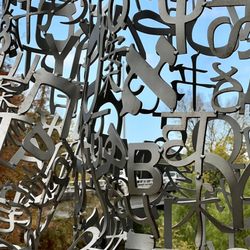 Tolerance Art Exhibit Statues On Allen Parkway - Seven Figures Representing the Seven Continents Each Created from Nine Alphabets