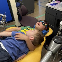 Bloom Brighten Kids Dentistry - They have comfy exam chairs and TVs for distraction from all the dental tool noises.