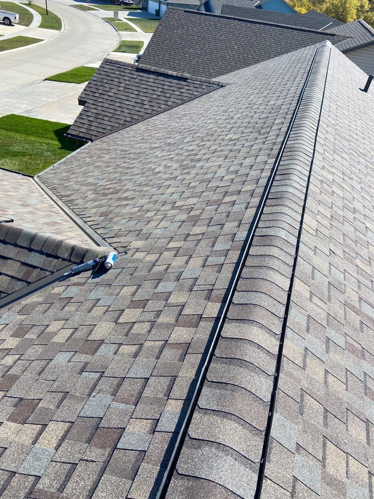 Slide of Roofing Service Company