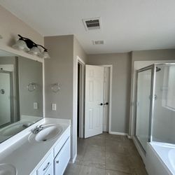 Fix It Outfitters - Bathroom painted and vanities replaced