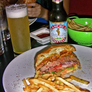 Photo of Bisou Bistronomy - San Francisco, CA, United States. Burger with Blanche de Bruxelles