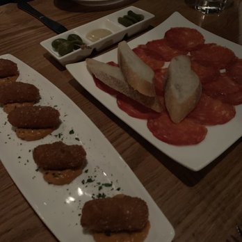 Amada - Ham croquettes (left) and chorizo (right) - Tapas Bars Near Me - Philadelphia, Pennsylvania Amada - Ham croquettes (left) and chorizo (right) - Tapas Bars Near Me - Philadelphia, Pennsylvania