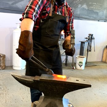 Lawless Forge - Ben, hammering the sh*t outta his knife. - Art Classes Near Me - Seattle, Washington Lawless Forge - Ben, hammering the sh*t outta his knife. - Art Classes Near Me - Seattle, Washington