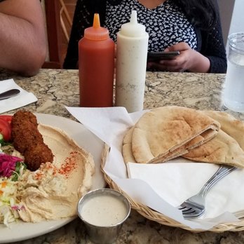 Small World Restaurant - Falafel platter. comes with fresh salad, humus, baba ganoush, pita and tahini - Middle Eastern Near Me - Napa, California Small World Restaurant - Falafel platter. comes with fresh salad, humus, baba ganoush, pita and tahini - Middle Eastern Near Me - Napa, California