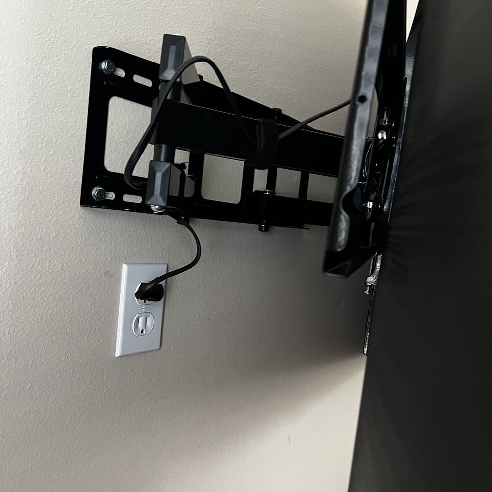 Hangtech - New electrical plug added to the wall and mount. - Home Theatre Installation Near Me Hangtech - New electrical plug added to the wall and mount. - Home Theatre Installation Near Me