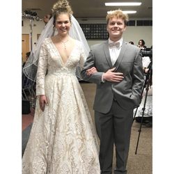 Uniquely Yours - Gorgeous long sleeve MacDuggal gown and Jim's Formal Wear Tuxedo!