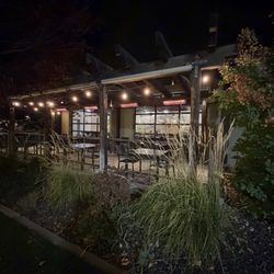 Night ambience at South Perry pizza- patio seating with string lights