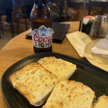 Silly Al's Pizza - Bar area garlic cheese bread, beer and football. - Pizza Near Me - Quartzsite, Arizona