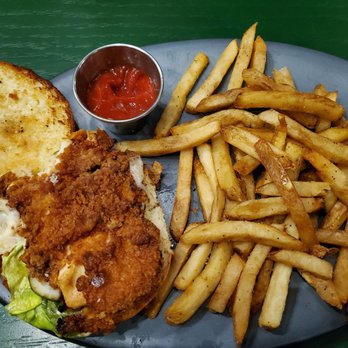 ComicX Restaurant Bar & Store - The Villain: Fried Chickenlicious sandwich. I would say more NUKED than fried... all I tasted was burnt breading and stiff chicken. - American Near Me - Phoenix, Arizona ComicX Restaurant Bar & Store - The Villain: Fried Chickenlicious sandwich. I would say more NUKED than fried... all I tasted was burnt breading and stiff chicken. - American Near Me - Phoenix, Arizona