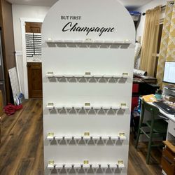 Extraordinary Balloons - Our Champagne Wall Rental holds 40 flutes (included) and makes the perfect statement piece for your event! Starting at $150