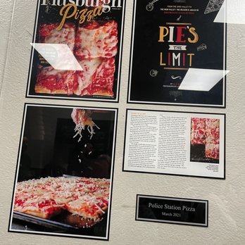 Pizza House - a pizza being cut and displayed - Pizza Near Me - Ambridge, Pennsylvania