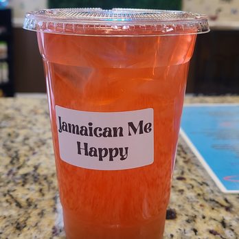 Sweet Illusions - a cup of orange juice on a table - Gluten-Free Near Me - Hephzibah, Georgia Sweet Illusions - a cup of orange juice on a table - Gluten-Free Near Me - Hephzibah, Georgia
