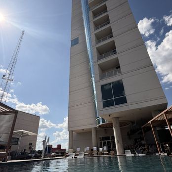 Thompson San Antonio - Riverwalk - View of the building from the pool - Hotels Near Me - San Antonio, Texas Thompson San Antonio - Riverwalk - View of the building from the pool - Hotels Near Me - San Antonio, Texas