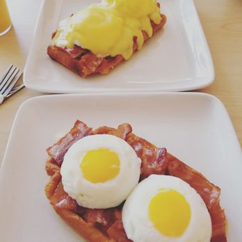Just Waffles - Cajon gator meat waffle in the back, bacon and 2 eggs (don't recall the name) in front. - Breakfast & Brunch Near Me - Vancouver, British Columbia