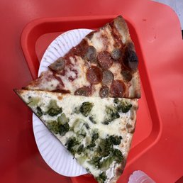 Pepperoni and sausage slice and a white broccoli slice. Need some veggies today. Lol. Pepperoni and sausage slice and a white broccoli slice. Need some veggies today. Lol.