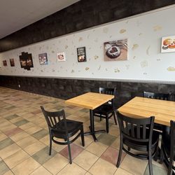 Sweet Inspirations Bakery - Interior seating area that very clean and room roam around.