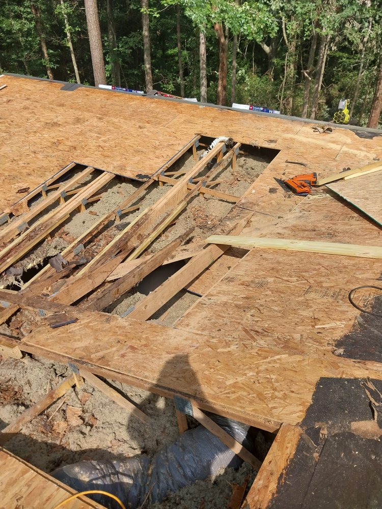 Slide of Tyndal Roofing