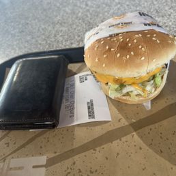 That's a burger by my iPhone. Burger is not big That's a burger by my iPhone. Burger is not big