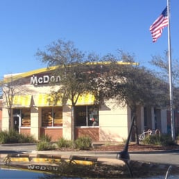 the front of a mcdonald's restaurant the front of a mcdonald's restaurant