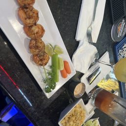 Jumbo shrimp, Mac & Cheese Bowl, and chicken nachos Jumbo shrimp, Mac & Cheese Bowl, and chicken nachos